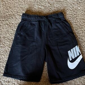 Nike Black Shorts With A Gray and White Logo. Like New Condition. Size Boys L
